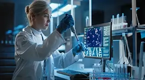Scientist working with samples in a lab