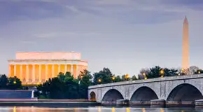 Wide shot of Lincoln Memorial and Washington Monument in twilight