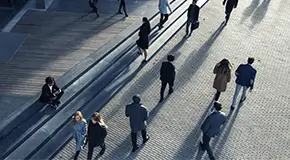 Business people walking to work in the morning on foot